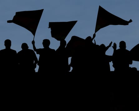 A silhouette of fans as they wave flags prior to the UEFA Women’s EURO 2025 Semi-Final match between Germany and Spain at Stadion Letzigrund on July 23, 2025 in Zurich, Switzerland.
