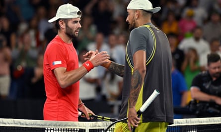 Jacob Fearnley shakes hands with Nick Kyrgios following their round one match at the Australian Open.
