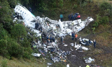 Rescue teams at the scene of the plane crash in Colombia.