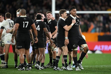 The All Blacks celebrate a penalty in the final seconds that secured their victory.