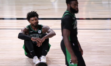 Marcus Smart (left) was unhappy with the contributions of Jayson Tatum and Jaylen Brown (right)