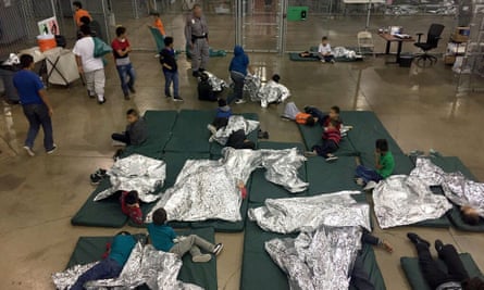A CBP photo shows children resting at a McAllen, Texas, detention facility.