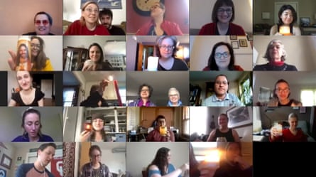 In March 2020, members of a virtual community choir light candles from their homes as seen from Brooklyn, New York.