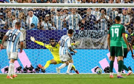 Lionel Messi scores his second goal.