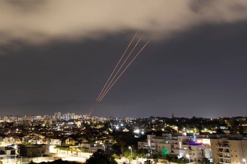 An anti-missile system operates after Iran launched drones and missiles towards Israel, as seen from Ashkelon, Israel