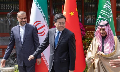 Iran's foreign minister, Hossein Amir-Abdollahian (left) and his Saudi counterpart, Prince Faisal bin Farhan Al Saud (right) with China’s foreign minister, Qin Gang, in Beijing.
