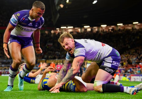 Tom Johnstone celebrates scoring for Wakefield in the second half