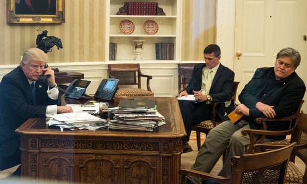 Flynn in the Oval Office with Trump and aide Steve Bannon in January 2017.
