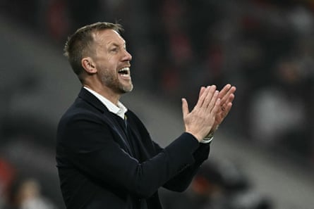 Graham Potter encourages his players from the touchline.