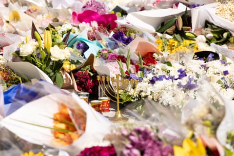 Memorial site at Bondi Pavilion with flowers and tributes to the victims