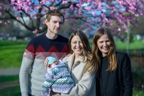 Grace and Angus Davidson with baby Amy Isabel, and the baby’s aunt and the donor of the womb, Amy Purdie.