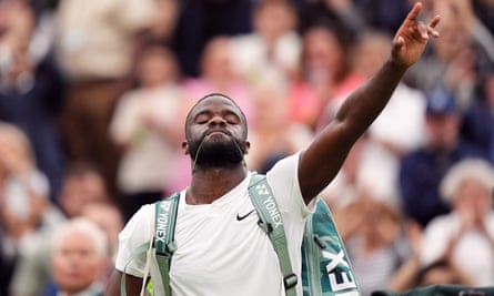 Frances Tiafoe salutes the crowd at the end of the match