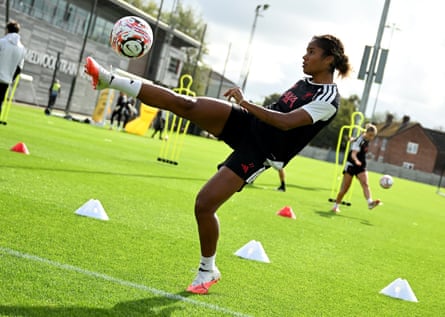 Aurélie Csillag kicks a ball at hip height during a Liverpool training session