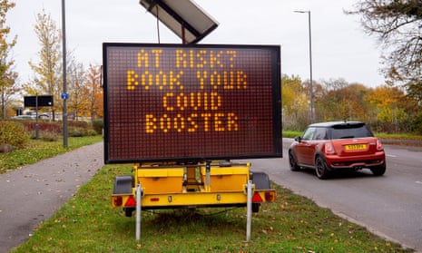 A road sign in Buckinghamshire says: At risk? Book your Covid Booster