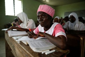 It has been hard to juggle classes and work, and deal with the stigma, but Ajayi says she is not ashamed to wear a school uniform