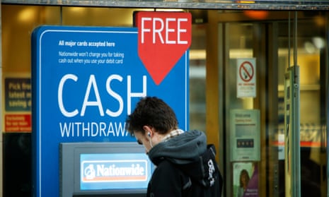 Nationwide customer uses the cash machines