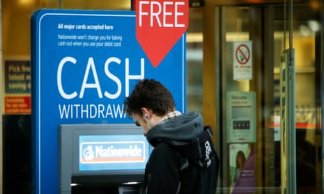 A Nationwide customer uses a free cash machine