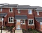 Construction At A Bellway Plc House Building Site Ahead Of EarningsAn advertisement for the U.K. Government's "Help to Buy" scheme sits on a poster outside a new terraced residential home at a Bellway Plc real estate site in Northampton, U.K., on Thursday, Oct 10, 2013. U.K. house prices rose to a record last month as easier access to credit drove first-time buyers back to the market, Acadametrics said. Photographer: Chris Ratcliffe/Bloomberg via Getty Images