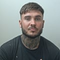 Ryan Wellings showing tattooed neck