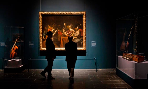 Visitors previewing an exhibit of French painter Valentin de Boulogne at the Metropolitan Museum of Art in New York.