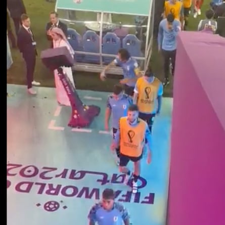 Edinson Cavani appears to punch a VAR pitchside monitor on his way back to the dressing room.