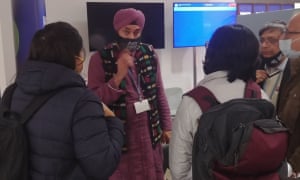 Delegates at Cop26 on the final Friday