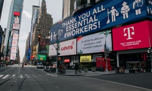 Messages of support for healthcare workers and essential employees cover the electronic billboards of a Times Square on April 17, 2020 in New York City. The “crossroads of the world” has become a ghost town during the coronavirus pandemic.