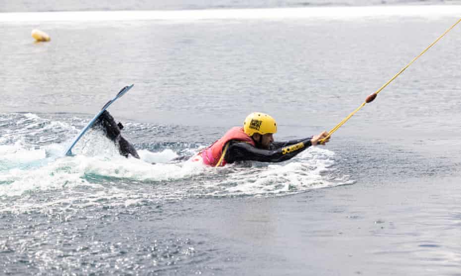 Rhik Samadder being dragged through the water while learning to wakeboard