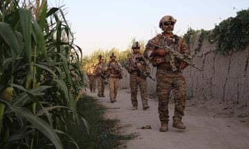 Afghan special forces patrol during an operation against Taliban militants in October 2019, in Helmand province, Afghanistan.