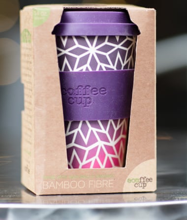 A reusable bamboo coffee mug.