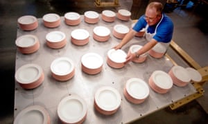 A worker at a plate factory in Stoke on Trent