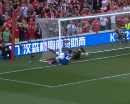 Taiwo Awoniyi clatters into the post after attempting to meet Elanga’s cross under pressure from Facundo Buonanotte