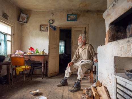 Re-settler Vasiliy Semyonovych Razumenko at his home in the exclusion zone.