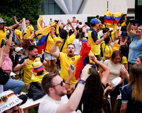Ecuador fans celebrate during a watch party for their team.