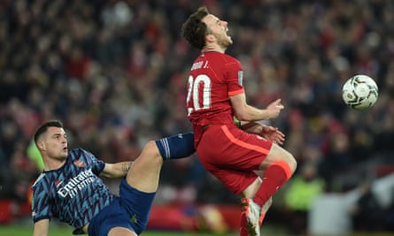 Granit Xhaka of Arsenal takes out Diogo Jota of Liverpool and gets a red card