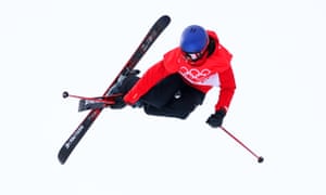 Eileen Gu reaches for a grab.
