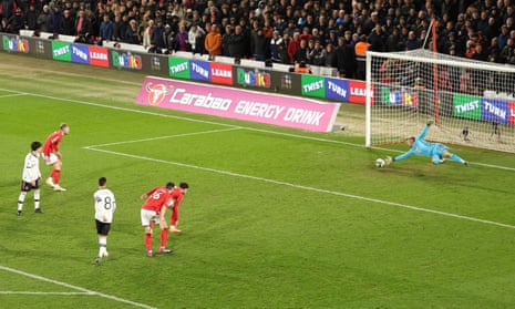 Bruno Fernandes of Manchester United scores their third goal past Wayne Hennessey in the Nottingham Forest v Manchester United, Carabao Cup, Semi Final, First Leg.