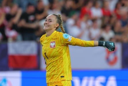 The Poland goalkeeper Kinga Szemik celebrates a goal