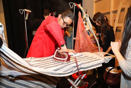Akira Isogawa ironing clothes backstage at his show at Australia fashion week in May 2017.