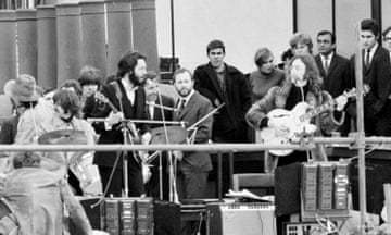 The Beatles performing on the Apple Headquarters’ rooftop in London 1969