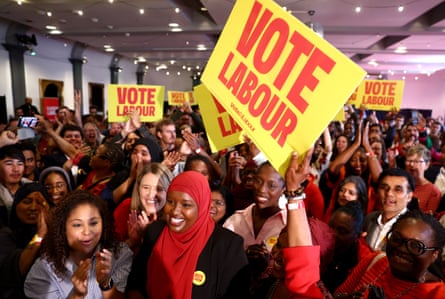 Sagal Abdi-Wali surrounded by supporters holding ‘vote Labour’ banners