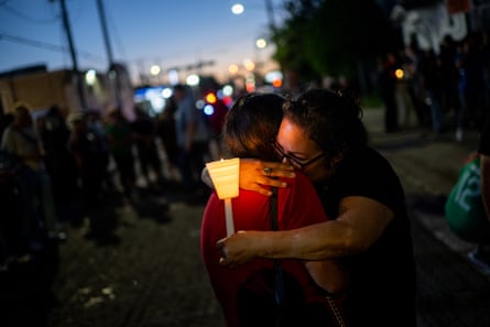 two group hug arsenic 1 holds a candle