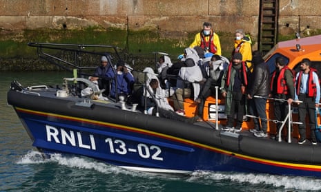 Migrants rescued onboard the Dungeness lifeboat arrive in Dover, Kent