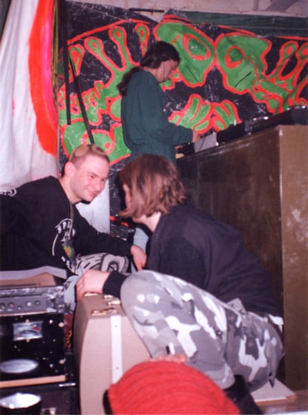 DJs and people at a house party.