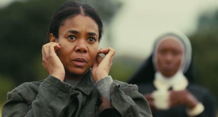 Regina Hall with her hands to her face in One Battle After Another.