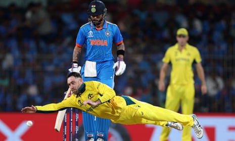 Glenn Maxwell of Australia attempts to dive for a catch.