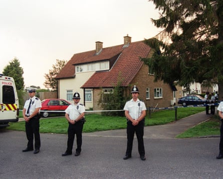 Police outside the home of Maxine Carr and Ian Huntley in 2002.