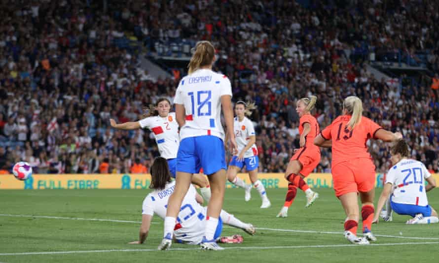England's Beth Mead scores her fifth goal.
