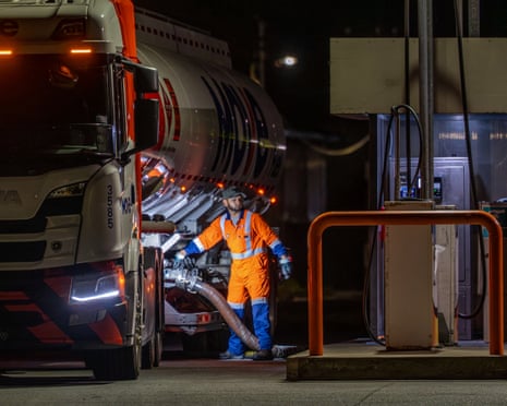 A fuel tanker driver fills the tanks of a petrol station in Wellington, New Zealand, last week