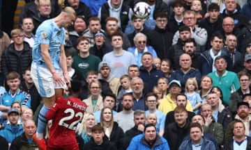 Erling Haaland (left) heads home his, and Manchester City’s second goal of the game